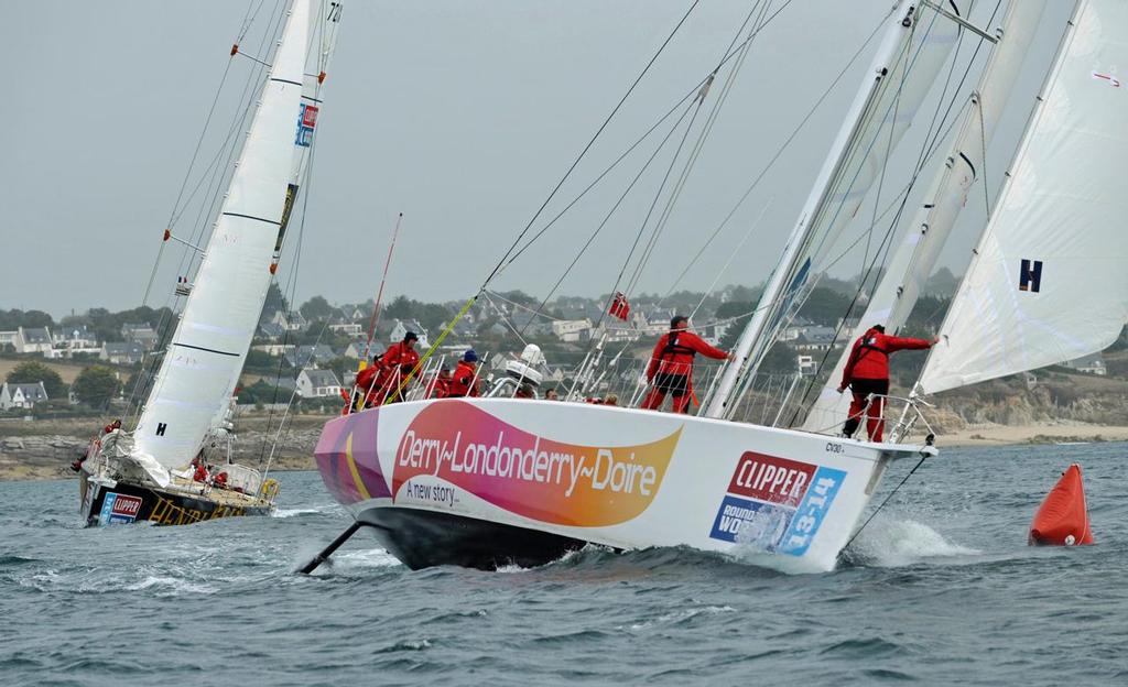 Derry~Londonderry~Doire rounds is the first to round the at the start of Race 2 of the Clipper 13-14 Round the World Yacht Race, in Brest, France. © Clipper Ventures PLC . http://www.clipperroundtheworld.com